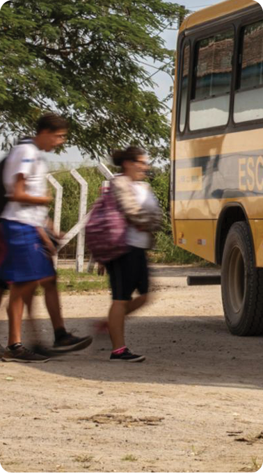 She used to walk at dawn. Now the bus stops at her door